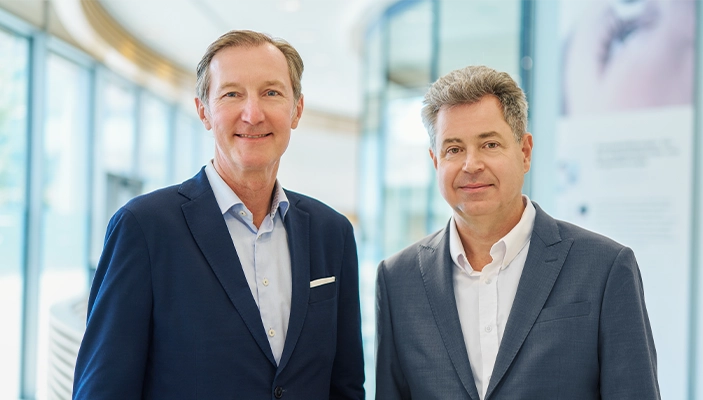Picture of Justus Felix Wehmer, Chief Financial Officer of Carl Zeiss Meditec AG, next to Maximilian Foerst, President and CEO of Carl Zeiss Meditec AG. 