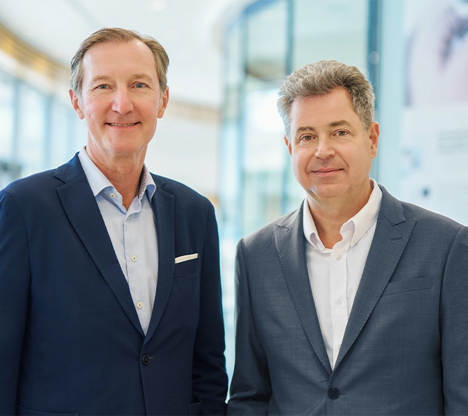 Picture of Justus Felix Wehmer, Chief Financial Officer of Carl Zeiss Meditec AG, next to Maximilian Foerst, President and CEO of Carl Zeiss Meditec AG. 